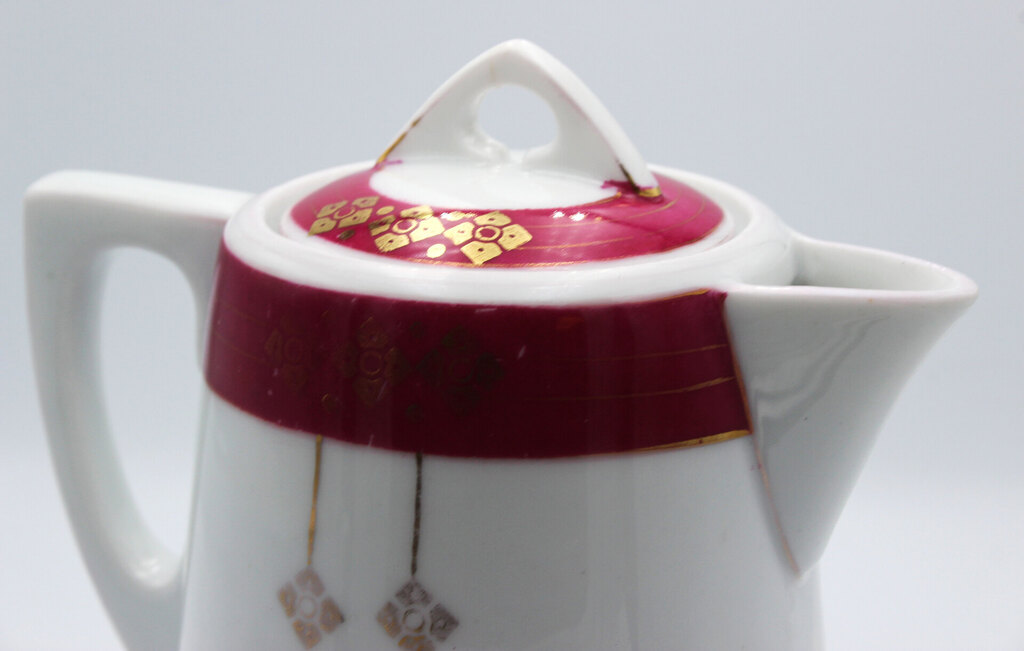 Art Nouveau porcelain jug with a lid