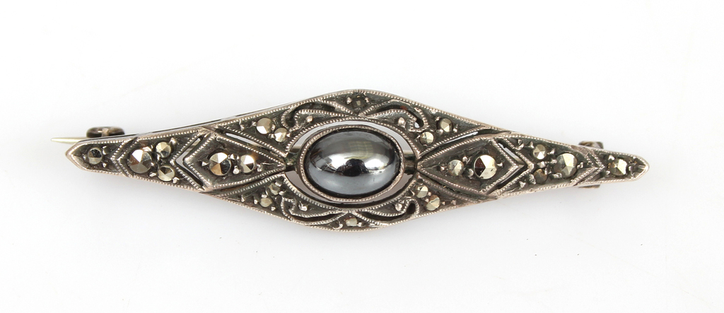 Silver brooch with mother-of-pearl