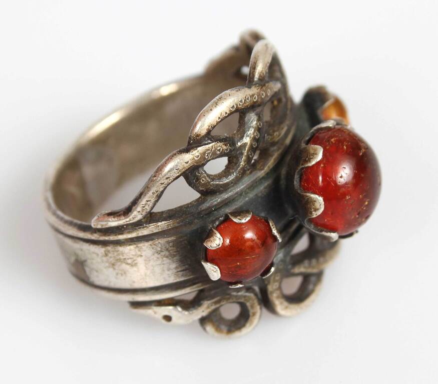Silver ring with amber inlays