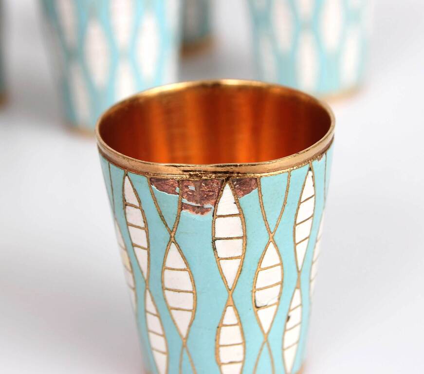 Metal cups with blue-white enamel