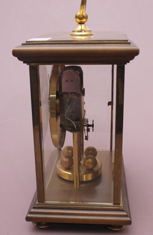 Clock with gilding