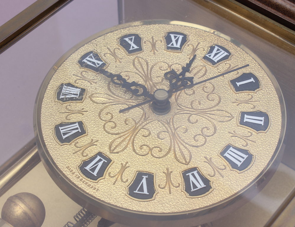 Clock with gilding