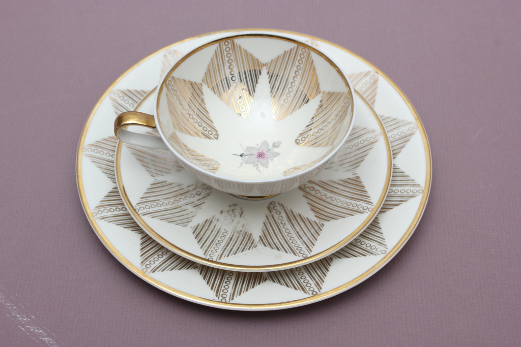 Porcelain cup with saucer and dessert plate