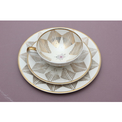 Porcelain cup with saucer and dessert plate