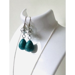Silver necklace and earring set with blue turquoise stones
