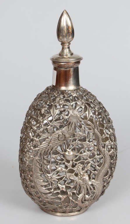 Glass decanter with metal