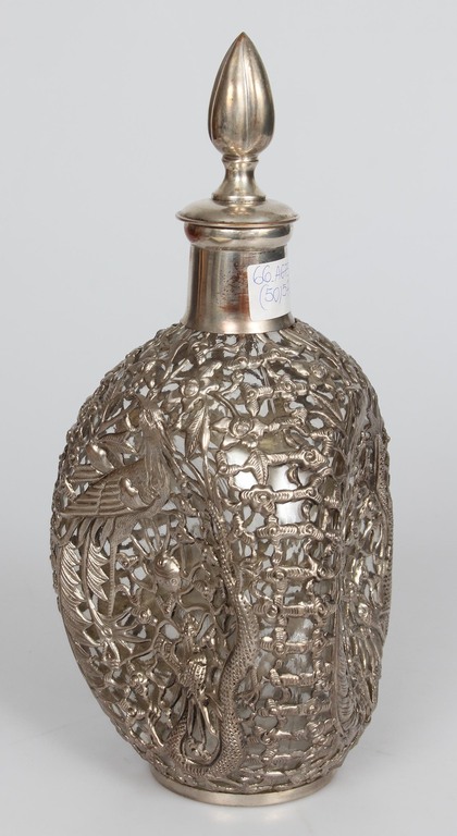 Glass decanter with metal