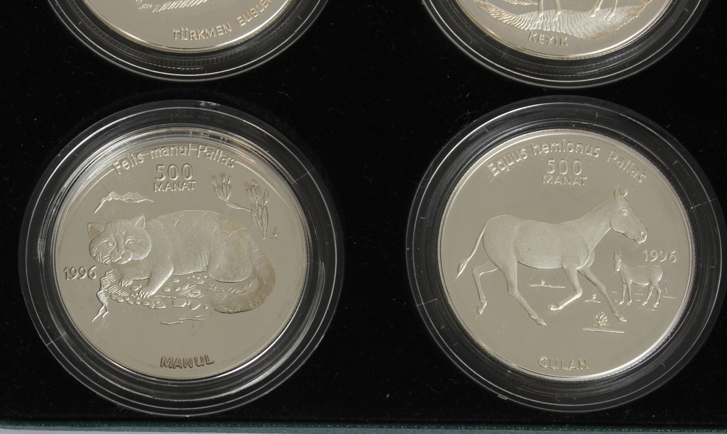 A set of Turkmenistan silver coins with engraved wild animals
