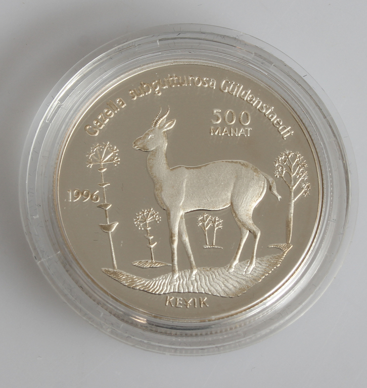 A set of Turkmenistan silver coins with engraved wild animals