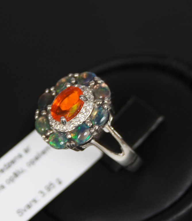 Silver ring with fire opal, opals