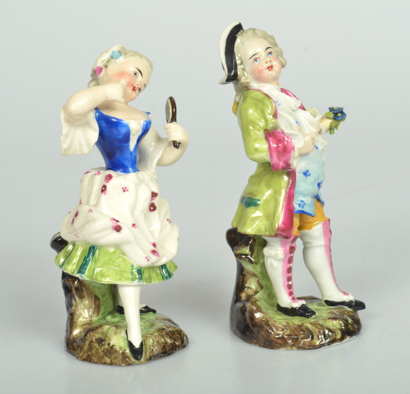 Two porcelain figurines A Lady and a gentleman