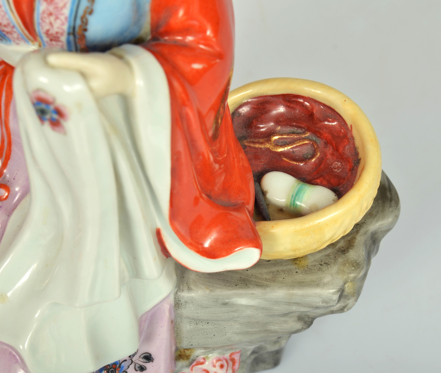 Porcelain figure Chinese girl with embroidery