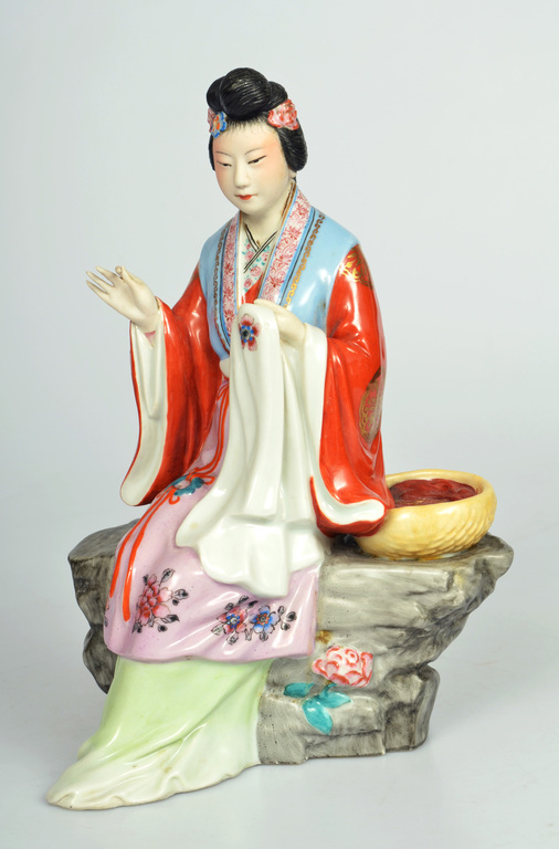 Porcelain figure Chinese girl with embroidery