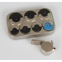 Metal coin holder and metal whistle