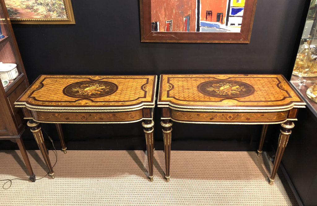 A pair of console (game) tables 