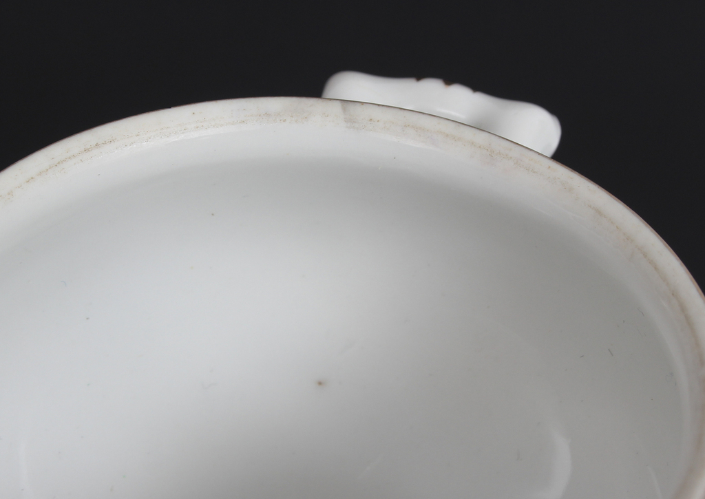 Porcelain spice bowl with silver spoon