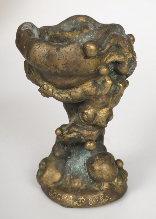 A bronze vessel with a spout