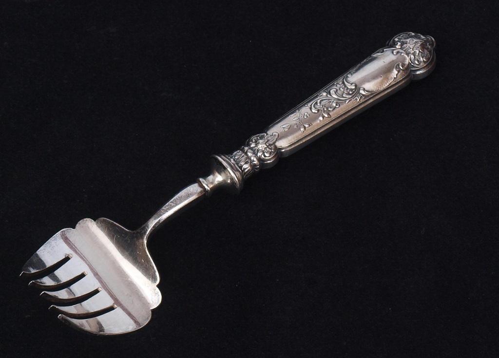 Silver serving fork for fishes 