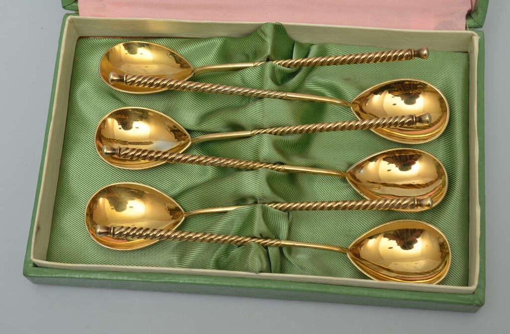 A set of gold-plated silver spoons