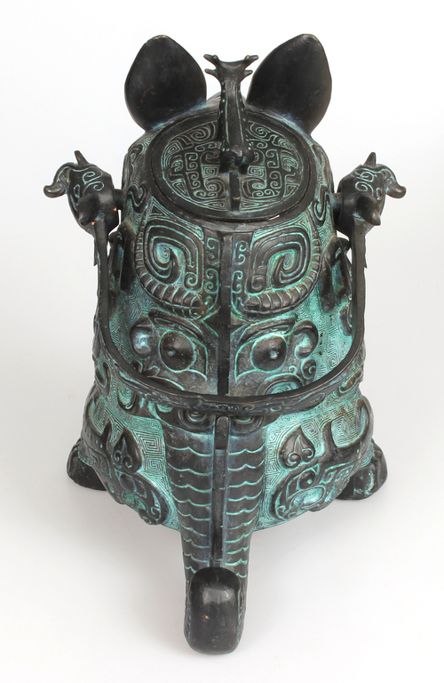 Patinated bronze wine vessel 