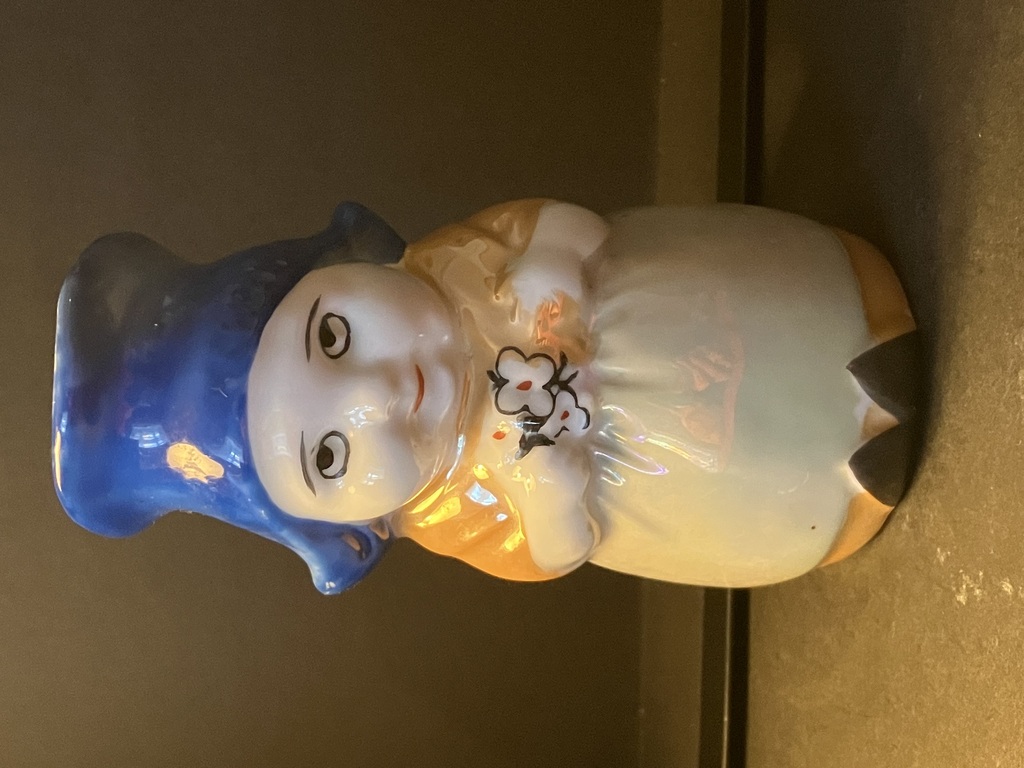 porcelain jug Annele in a blue hat with flowers