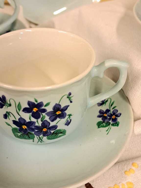 Gentle, elegant, breakfast tea-coffee service with spring violets