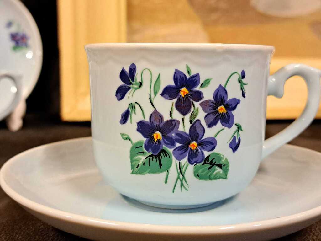 Gentle, elegant, breakfast tea-coffee service with spring violets
