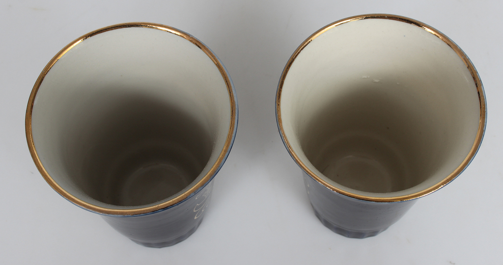 Porcelain jug with two cups