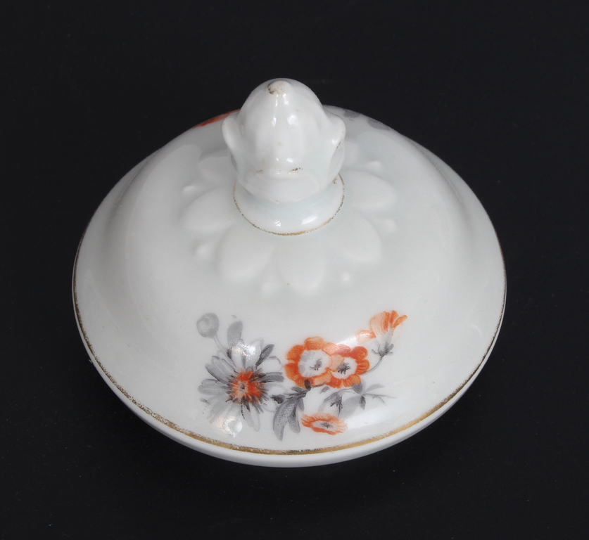 Porcelain sugar bowl with lid, cup with saucer and plate