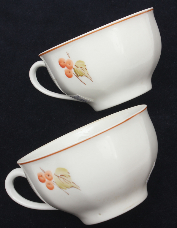 Painted porcelain cups and saucers (2 pcs.)