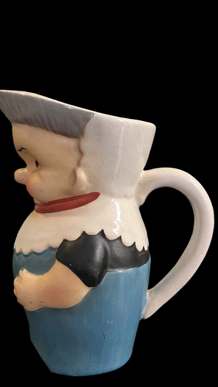 a rare porcelain jug young man with a bouquet of flowers