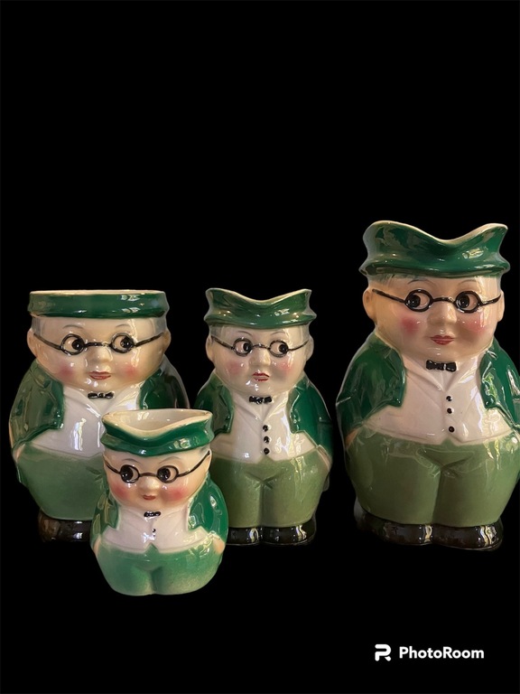 collection of porcelain jugs the bespectacled man in the green jacket MR Pickwik. made in Germany by Goebel