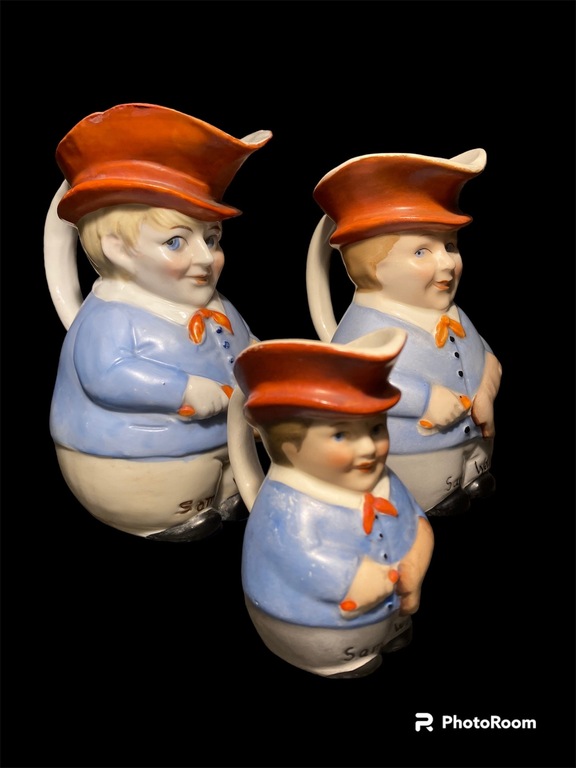 collection of porcelain teapots man with a red scarf in a red hat shoemaker with a boot sam weller carlz dickens short story hero