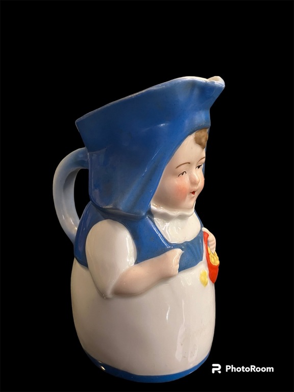 porcelain jug Annele in a blue hat with a beautiful fruit basket