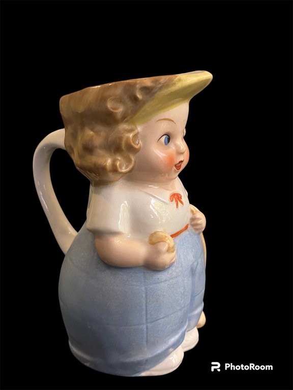 porcelain art deco teapot Annele holds a golf club in one hand and a ball in the other Goebel Germany