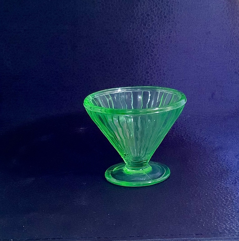 Hazelnut, vitriol glass. Bohemia 1900-20. Shot under an ultraviolet lamp.
