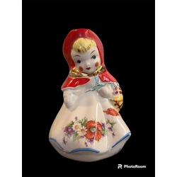 large porcelain mug red riding hood with a basket of fruit and a bouquet of flowers in her hand