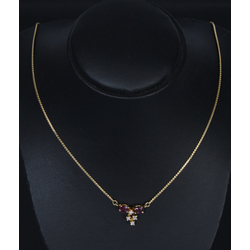 A gold necklace with diamonds and rubies?