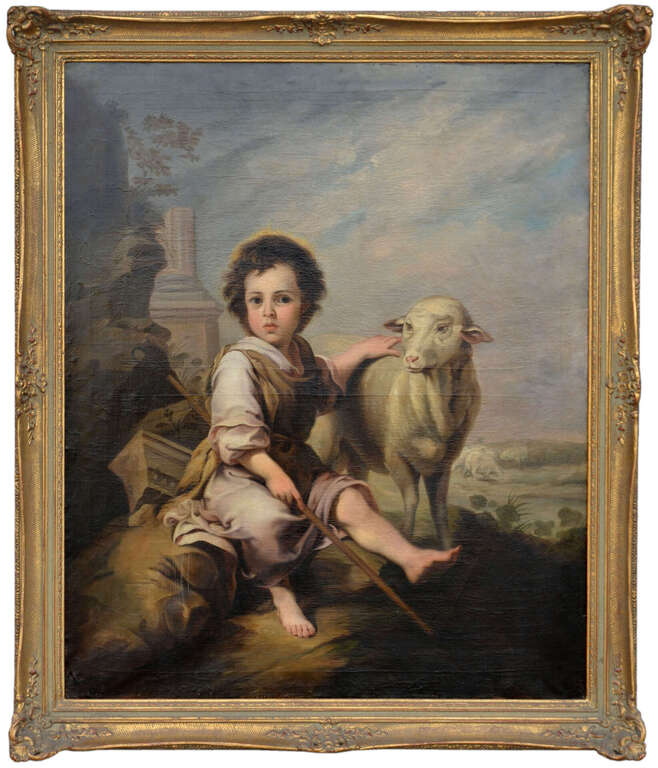 A boy with a lamb