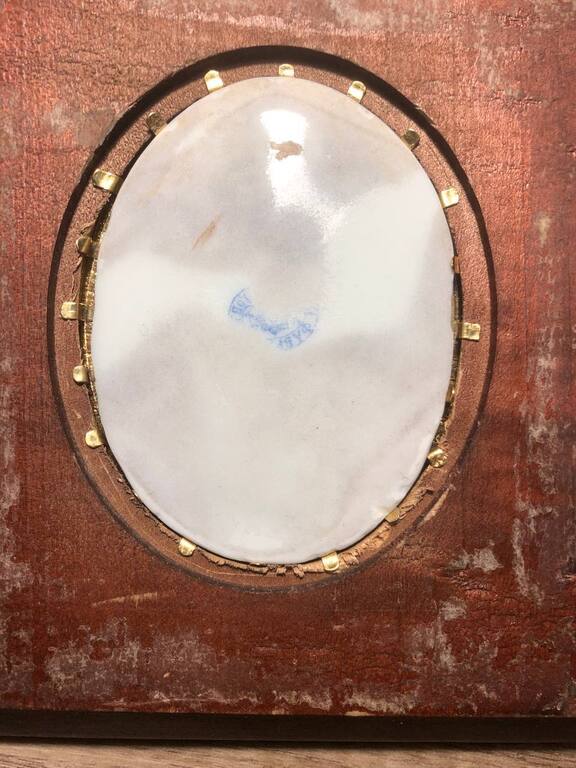 Decorative wooden frame with porcelain