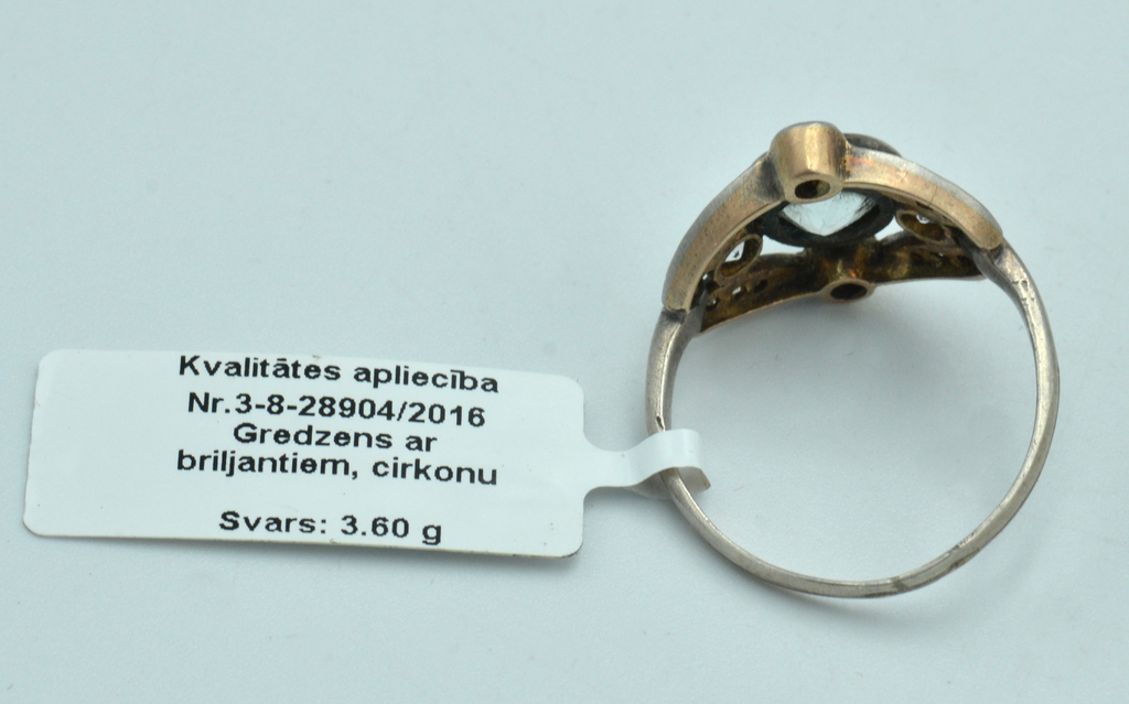 Кольцо из платины, золота и серебра с бриллиантами и цирконом