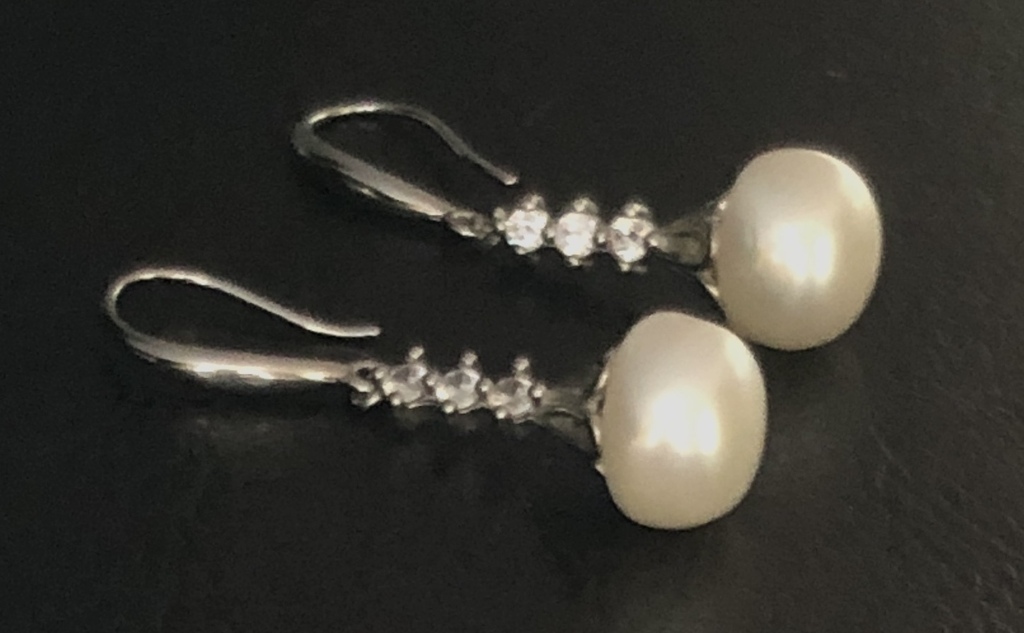 Silver earrings with white freshwater pearl.