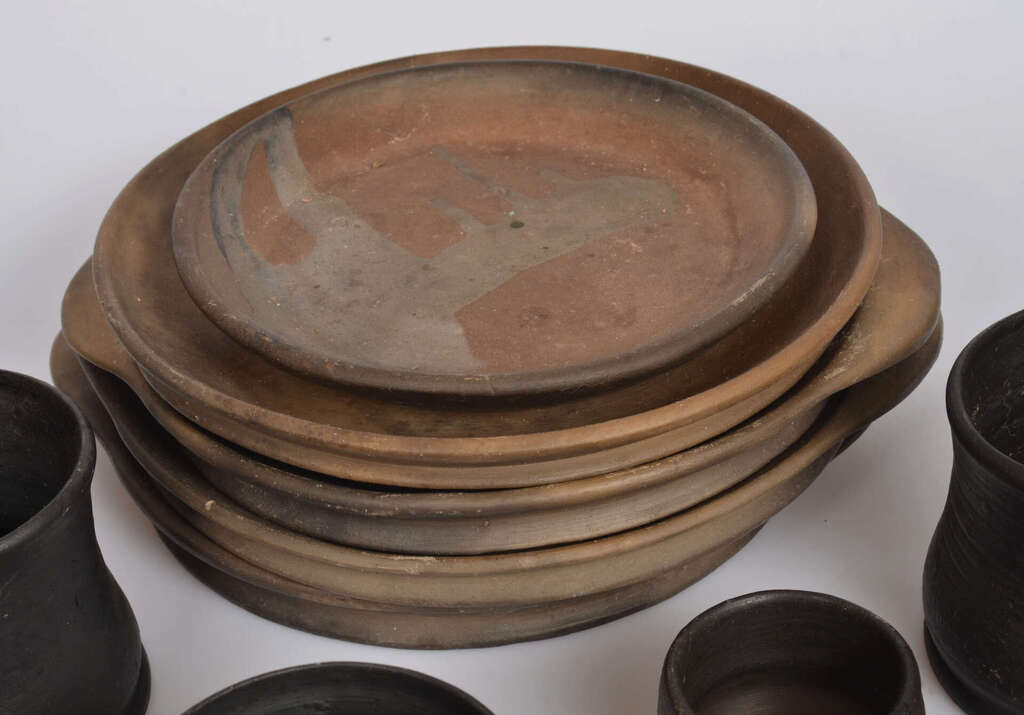 Black ceramic objects - cups, plates