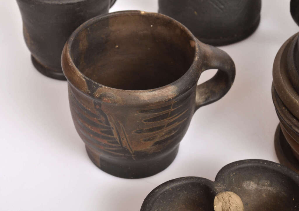 Black ceramic objects - cups, plates
