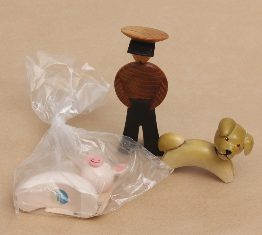 Three figurines - a piglet, a dog, a sailor