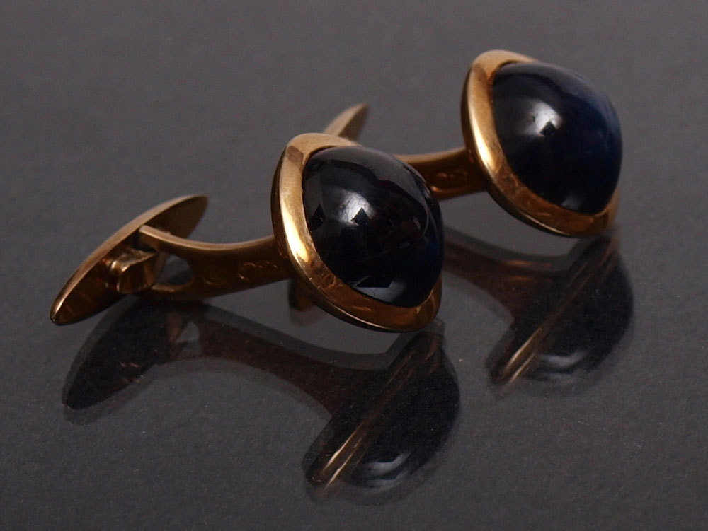 Gold cufflinks with sapphires