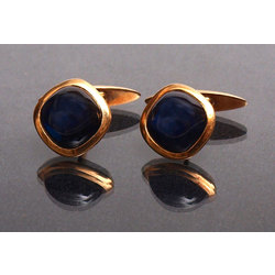 Gold cufflinks with sapphires