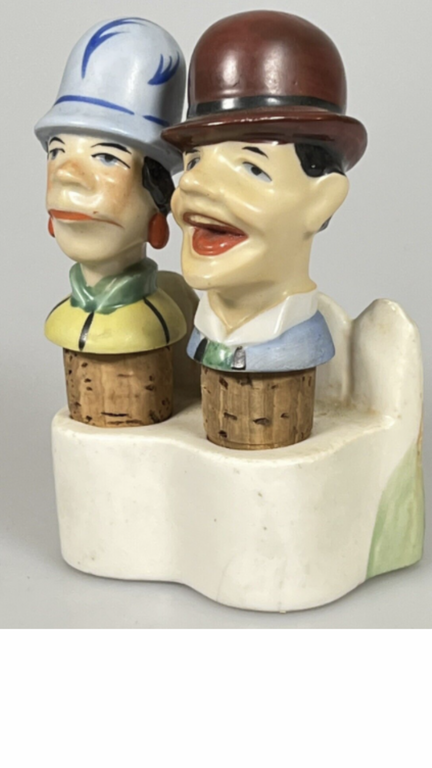 antique pair of porcelain bottle caps with stand smiling family behind the fence, 1920s -30s