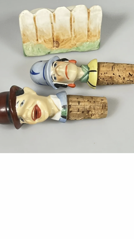 antique pair of porcelain bottle caps with stand smiling family behind the fence, 1920s -30s