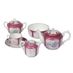 Porcelain service for 1 person - jug, sugar bowl, cream bowl, cup with saucer (INTA will bring another sugar bowl)